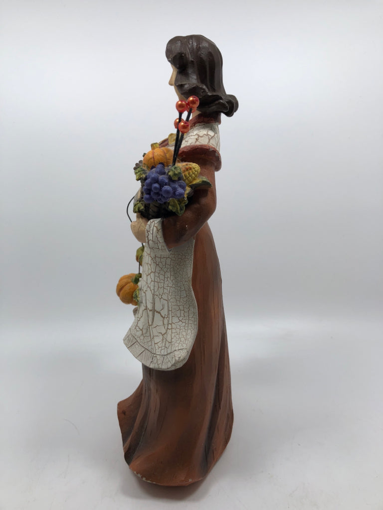 WOMAN HOLDING CORNUCOPIA "YOUNG" FIGURINE.