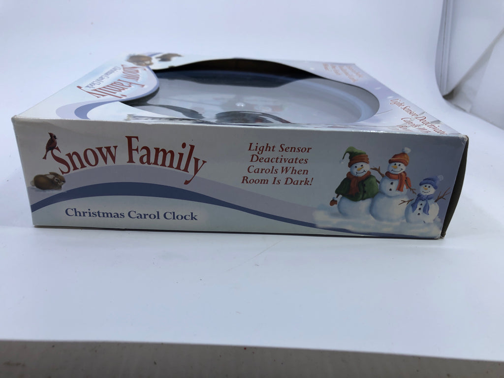 NIB SNOW FAMILY CHRISTMAS CAROL CLOCK.
