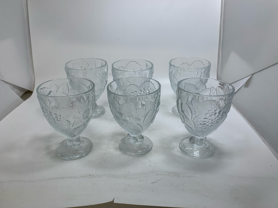 6 HEAVY FRUIT EMBOSSED PRESSED GLASS GOBLETS.