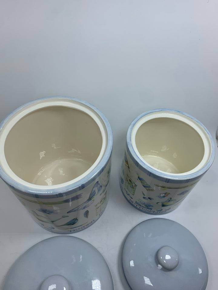 2 BLUE BIRDS AND BUTTERFLIES CANISTERS.