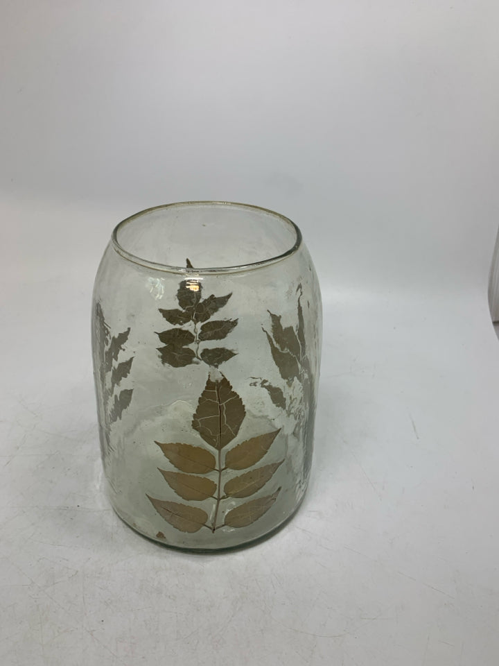 TEXTURED GLASS W/ IMPRINTED LEAVES PILLAR CANDLE HOLDER.