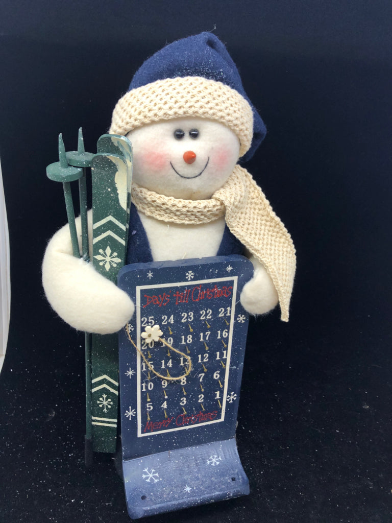 PLUSH SNOWMAN W SKIS AND CALENDAR.