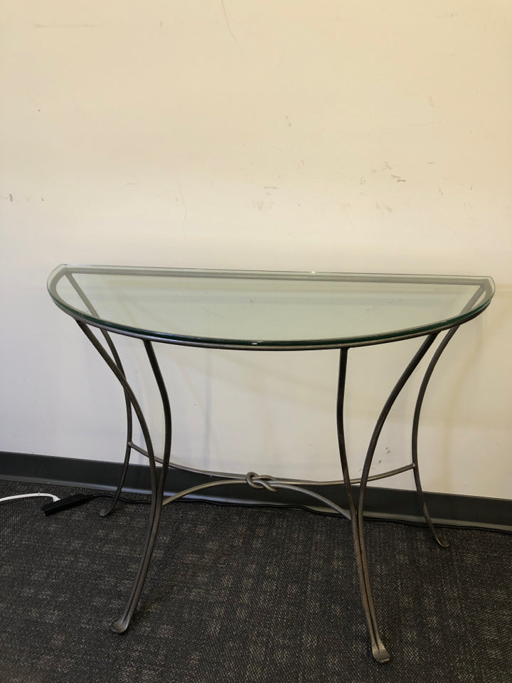 HEAVY METAL GREY HALF CIRCLE WALL TABLE WITH GLASS TOP.