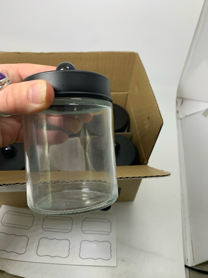 NIB 6 SMALL APOTHECARY JARS W/ BLACK LIDS.