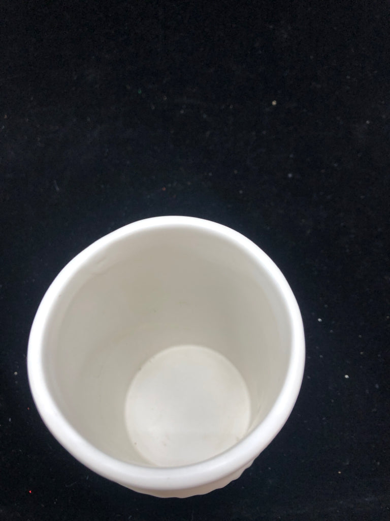 SLANTED TEXTURE CERAMIC VASE.