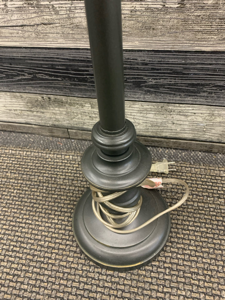 SILVER SKINNY BASE LAMP W TASSEL SHADE.