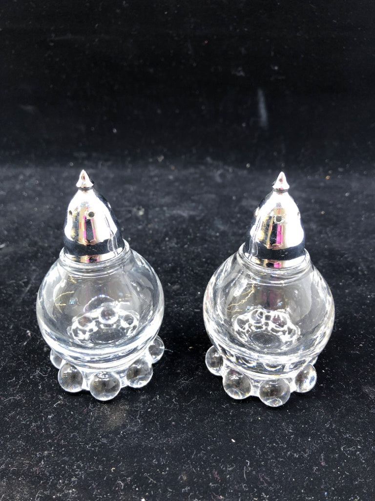 VTG ROUND GLASS SALT AND PEPPER SHAKERS.