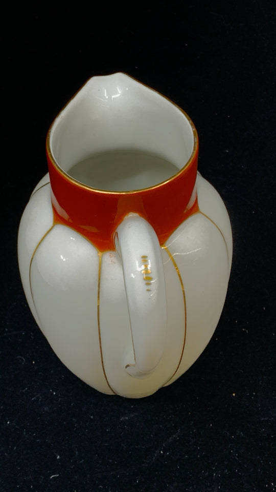 VTG GOLD RIBBED ORANGE SPOUT PORCELAIN PITCHER.