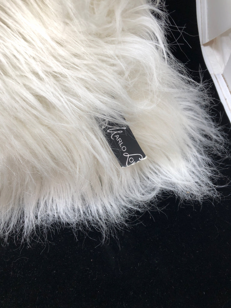 FLUFFY WHITE PILLOW W/TAGS.