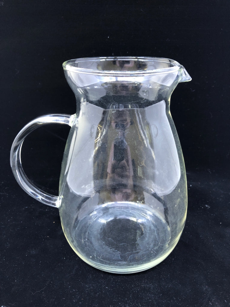 CLEAR GLASS PITCHER W HANDLE.