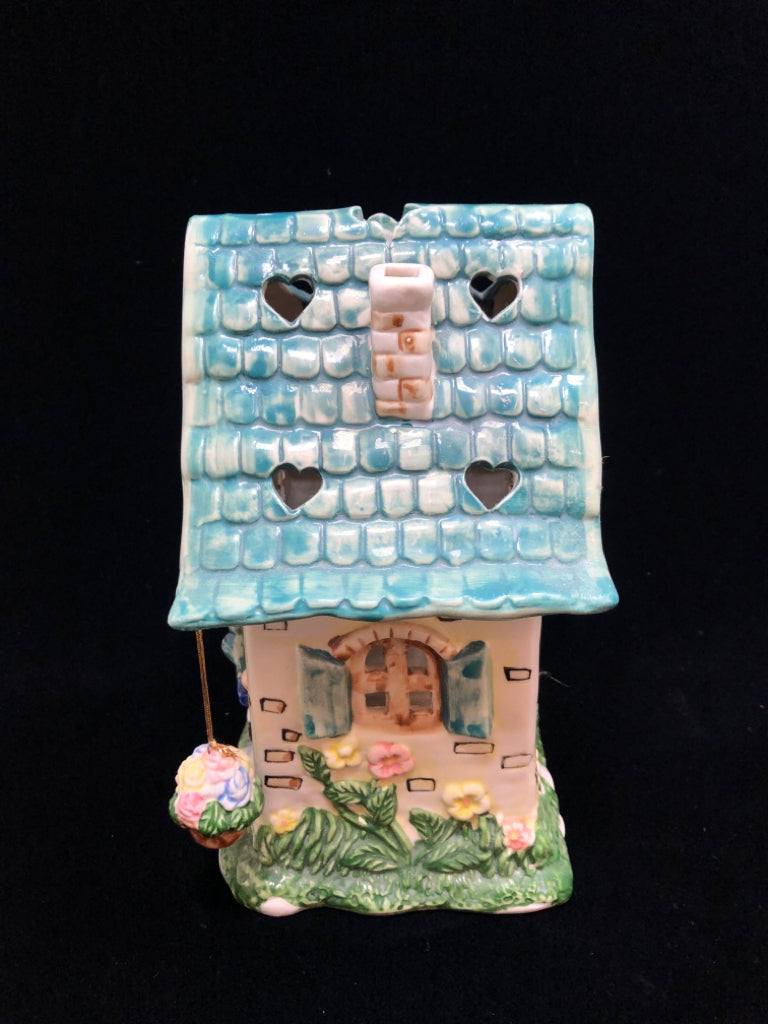 CERAMIC HOUSE TEA LIGHT HOLDER W/HANGING FLORALS.