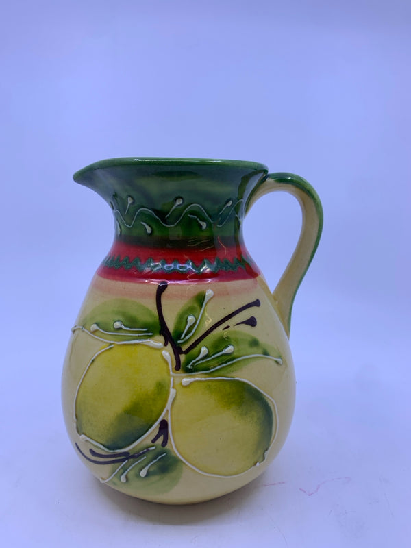 HAND PAINTED RED GREEN AND YELLOW PITCHER.