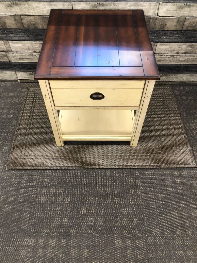 CREAM AND DARK WOOD TOP DISTRESSED END TABLE W 1 DRAWER.