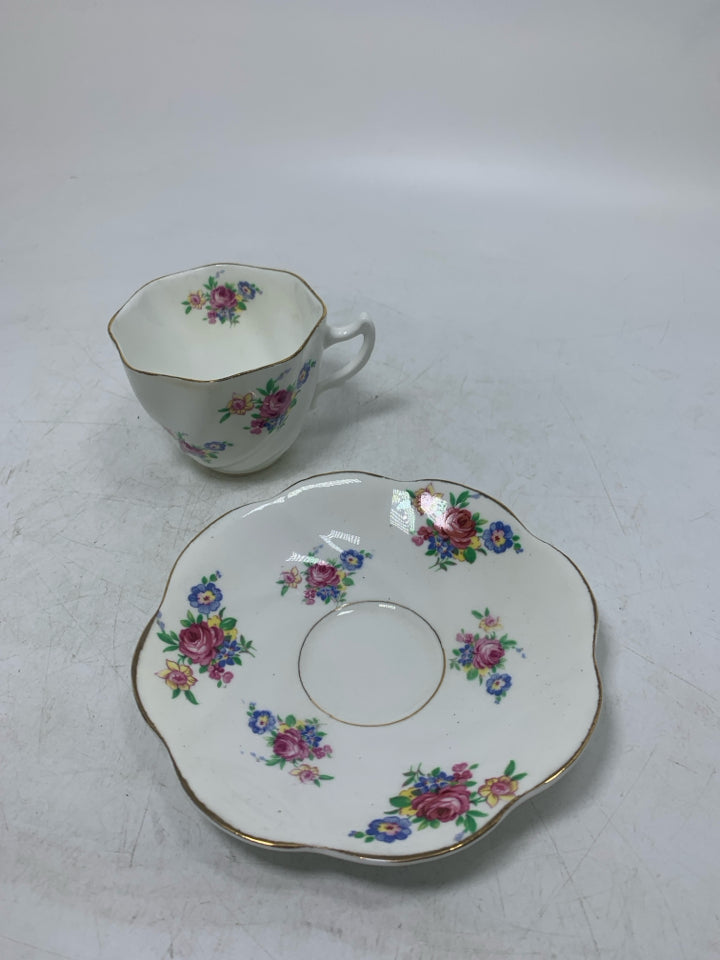 ASSORTED FLOWERS W/ GOLD RIM.