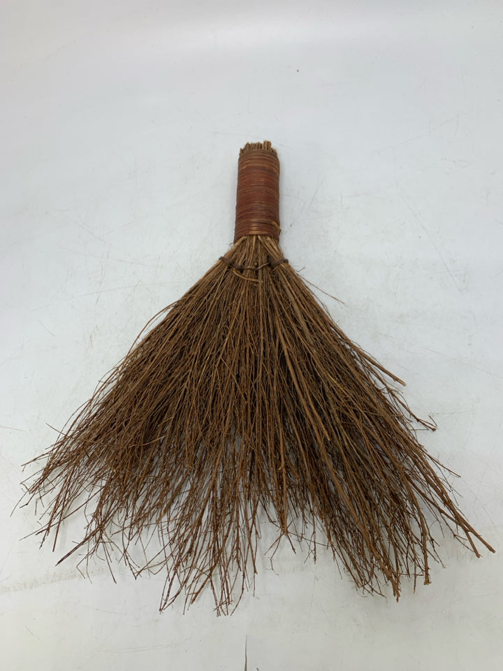 STICK BROOM WALL HANGING.