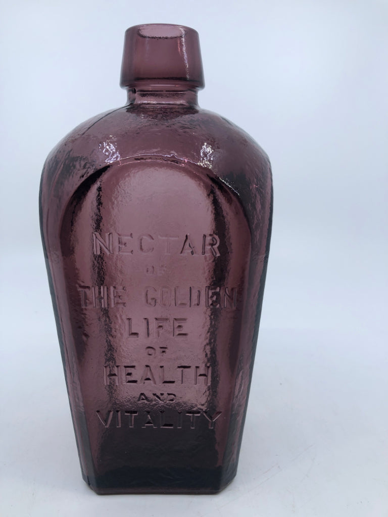 VTG SQUARE PURPLE ELIXIR EMPTY BOTTLE.