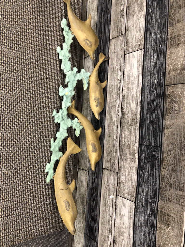 LARGE BRASS DOLPHINS WALL HANGING.