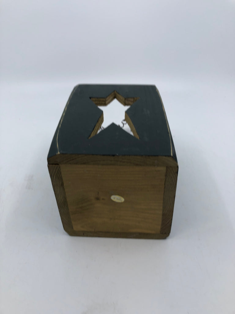 WOOD BLOCK W HANDLE AND CUT OUT STAR.