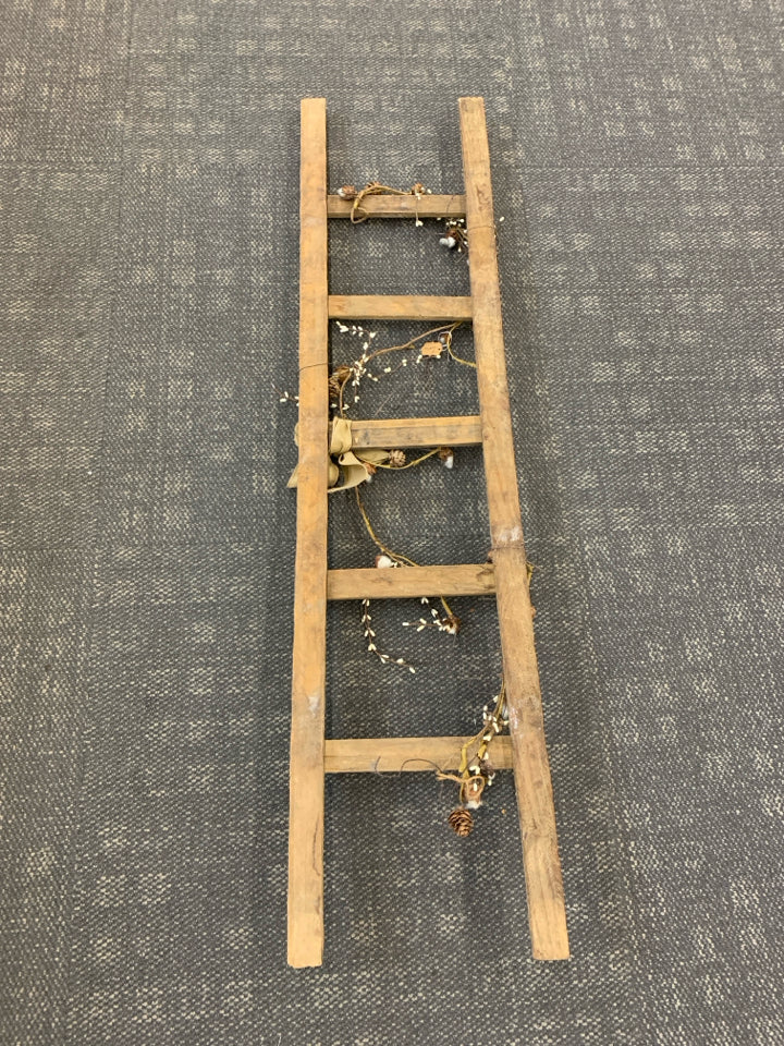 PRIMITIVE LADDER DECOR W/PIP BERRIES AND PINECONES.