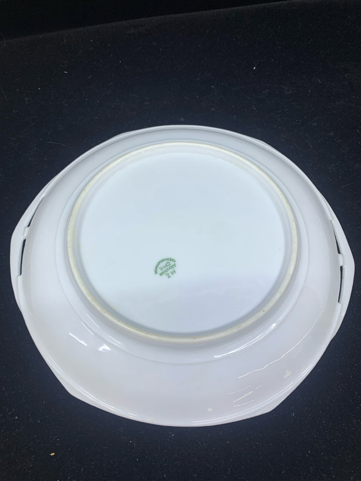 WHITE OVAL SERVING DISH WITH HAND DRAWN FLORAL DESIGN.