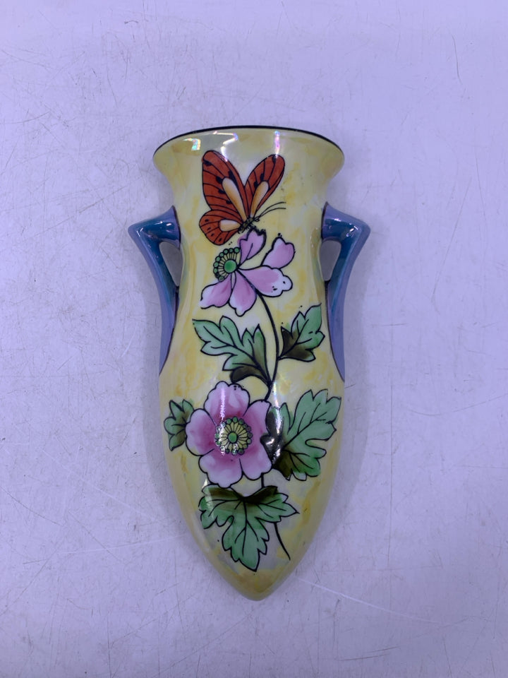 YELLOW/BLUE IRIDESCENT WALL VASE W/ PINK FLOWERS & BUTTERFLY.