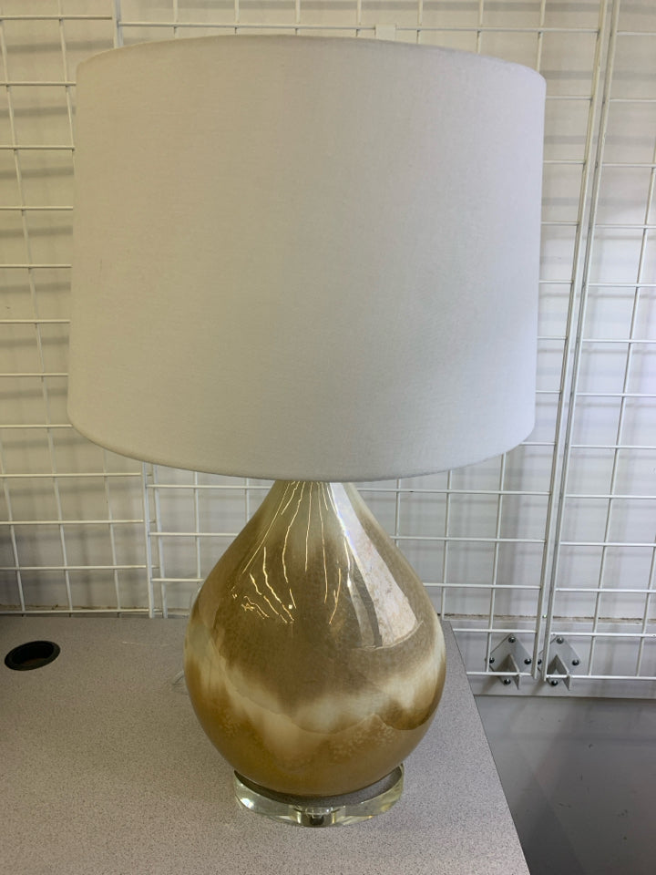 GOLD GLASS BASE LAMP W/WHITE SHADE.