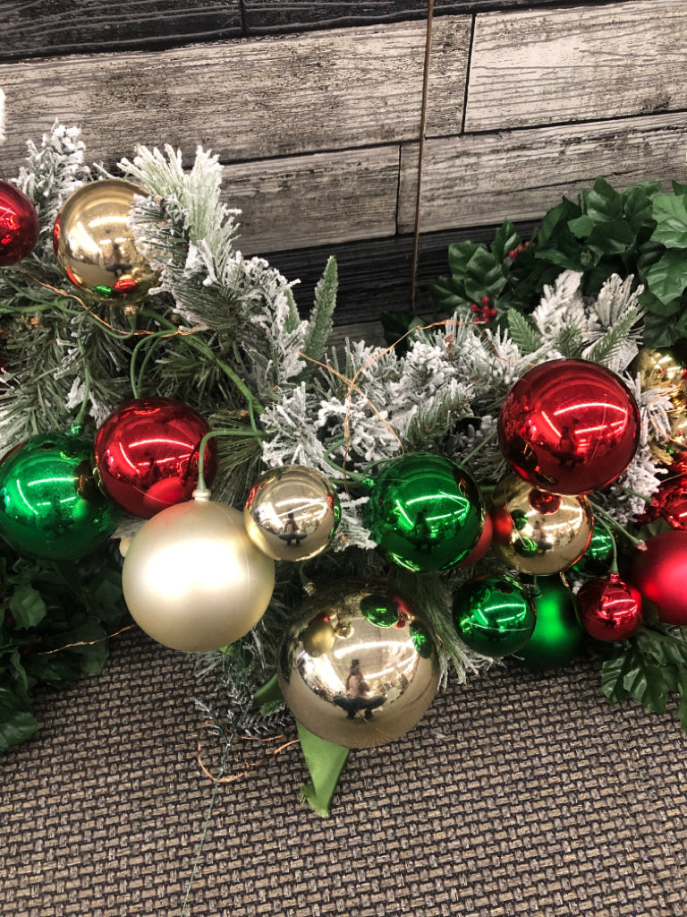 LARGE FROSTED LIGHTED GARLAND W/ ORNAMENTS.