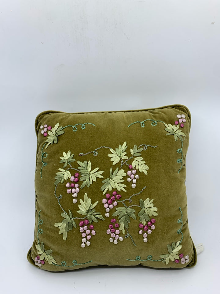 GREEN EMBROIDERED PILLOW.