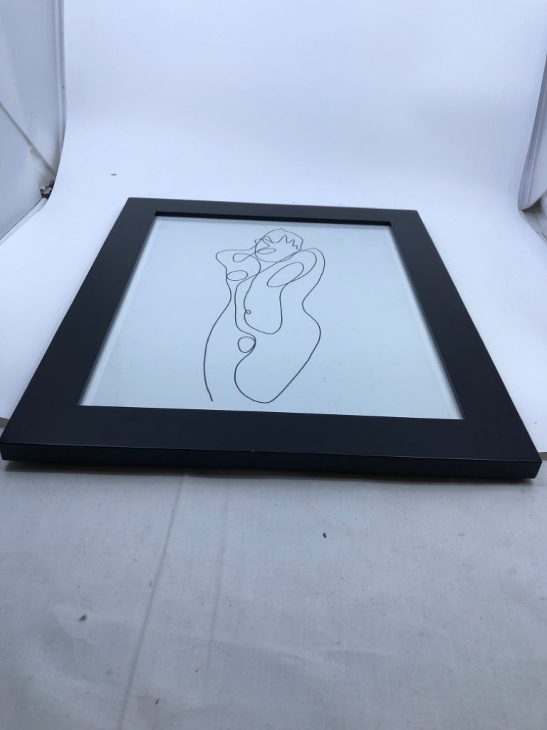 ABSTRACT WOMAN SCRIBBLE IN BLACK FRAME.