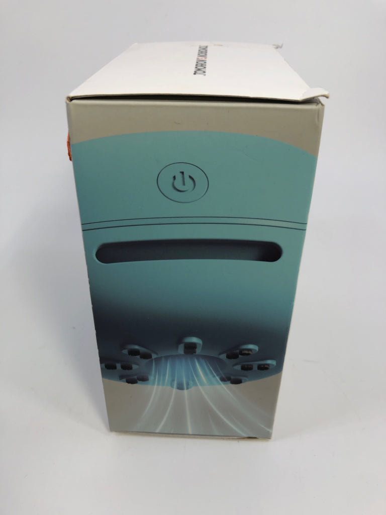 NIB SHARPER IMAGE DESKTOP VACUUM.