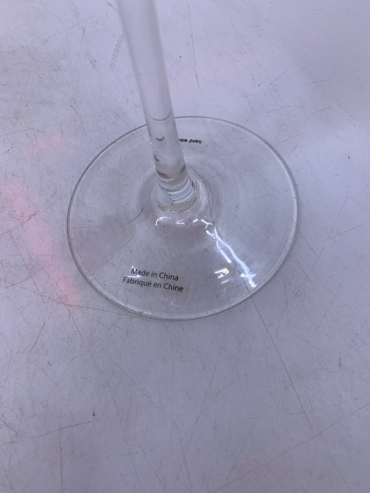 2 CLEAR GLASS STEM W/ RED TOP WINE GLASSES.