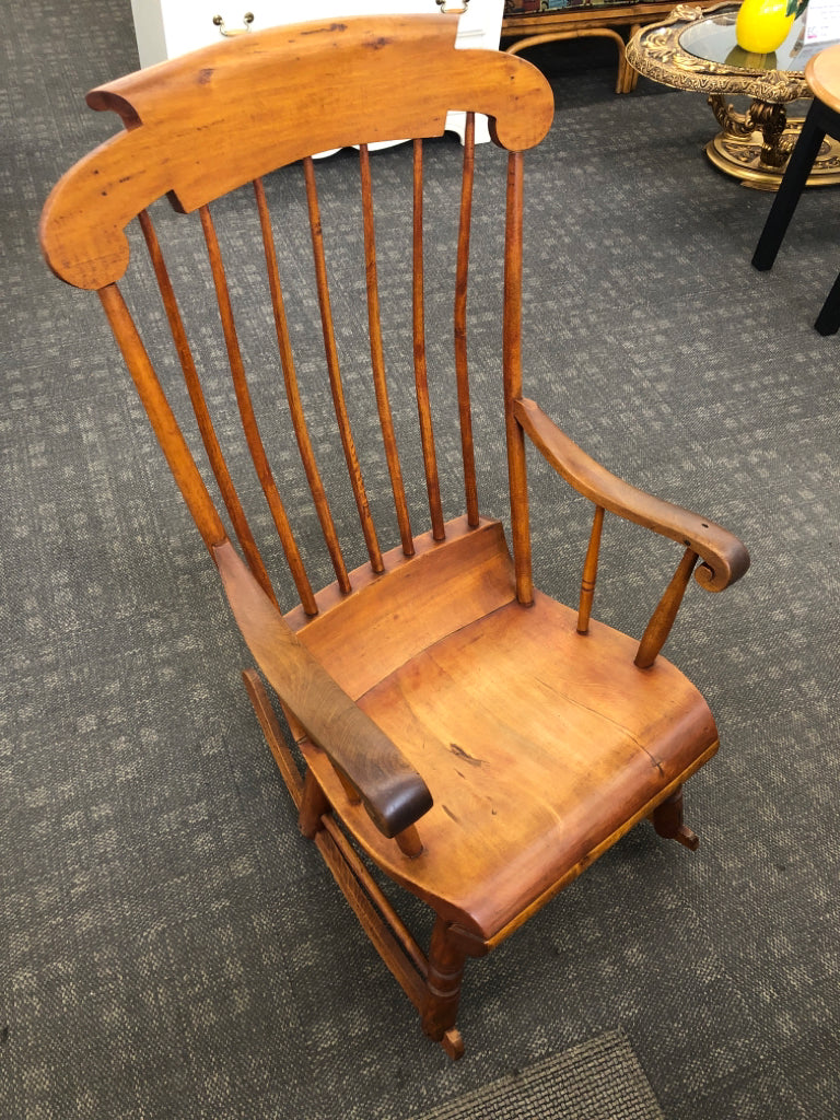 HAND-CRAFTED WOODEN ROCKING CHAIR.