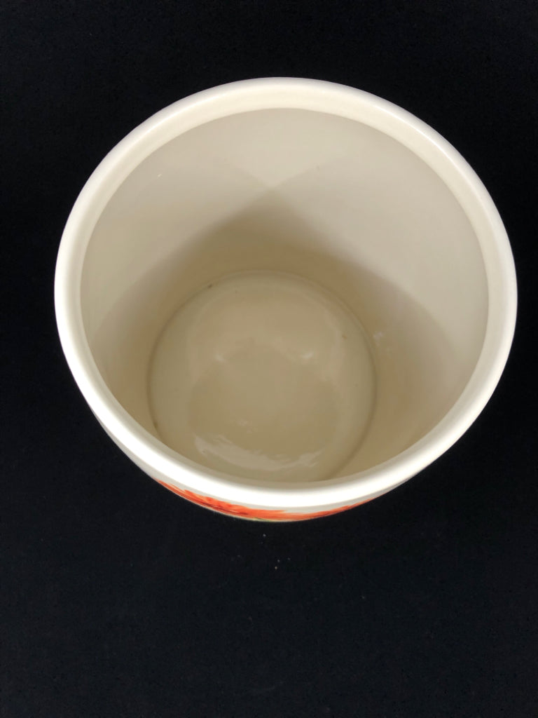 BEIGE BOTANICAL CERAMIC WASTE BASKET.