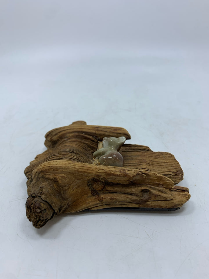 PORCELAIN KOALA ON RECLAIMED WOOD PIECE.
