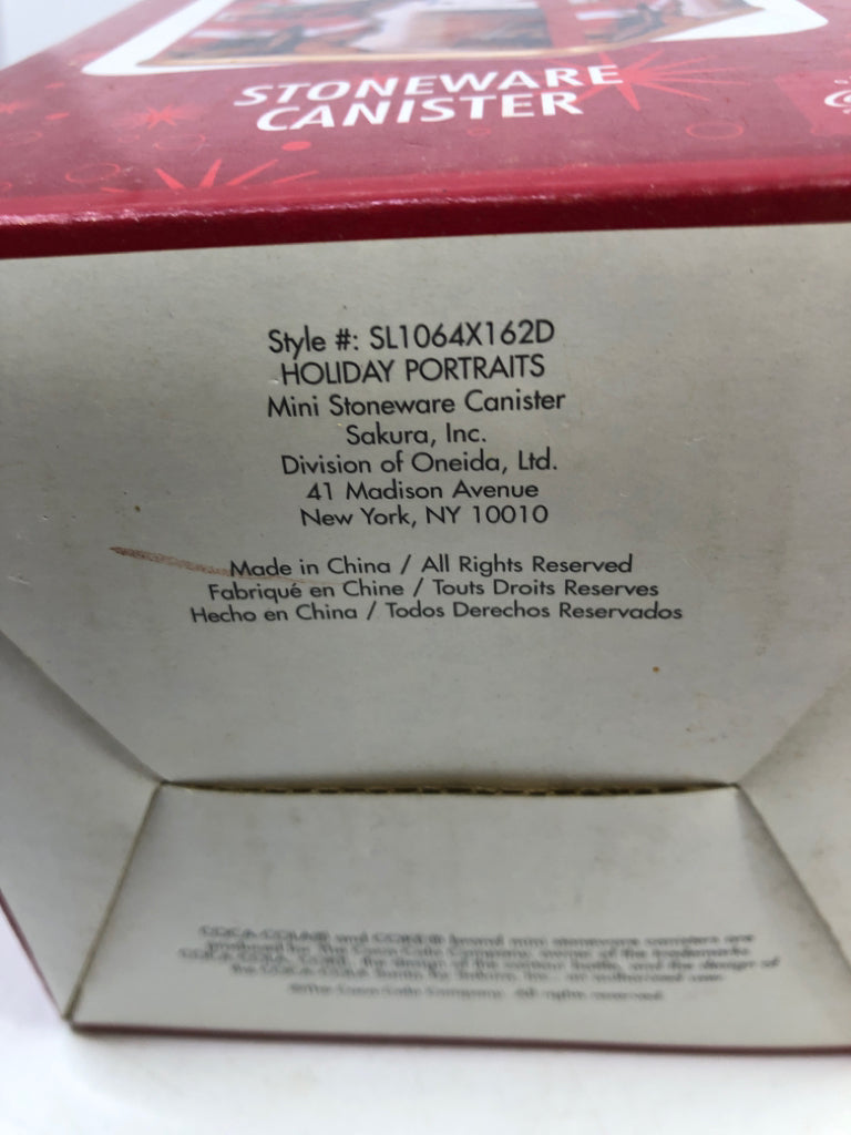 NIB GREEN SANTA STONEWARE CANISTER WITH LID.