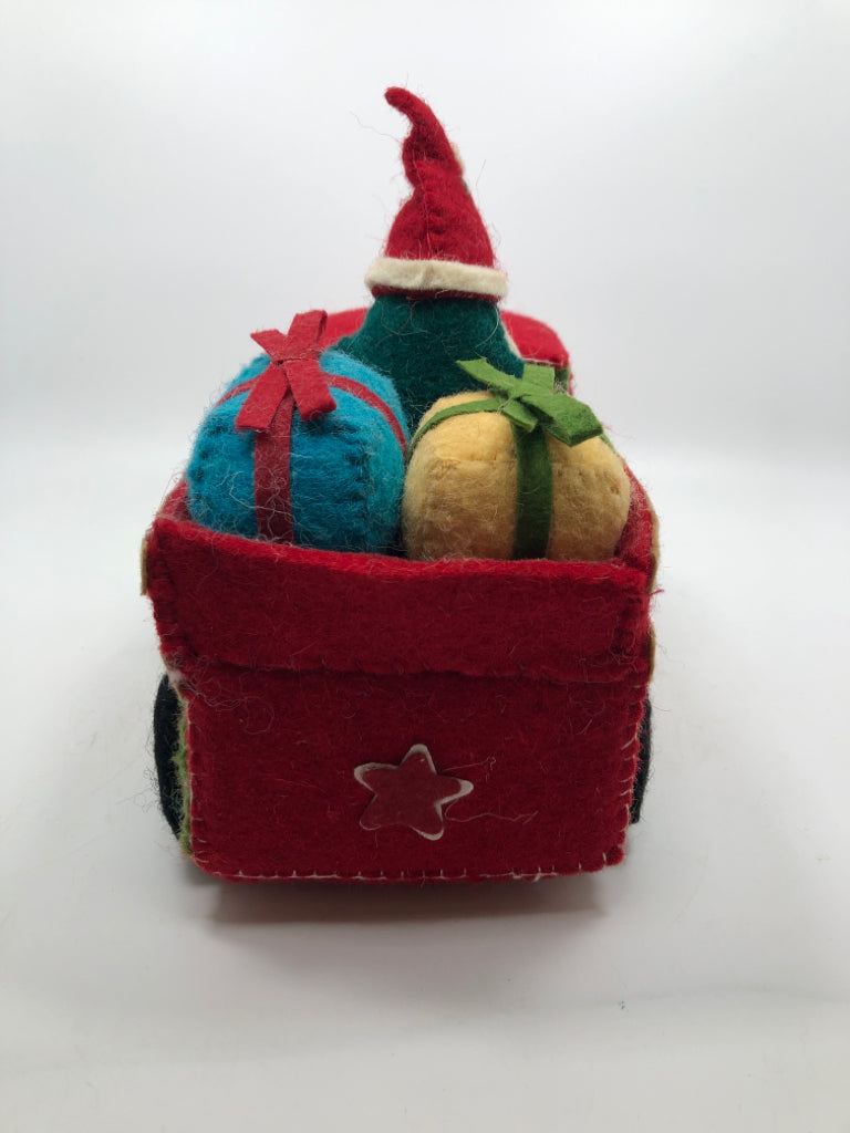 FELT RED TRUCK W/ GNOME/PRESENTS IN BED.