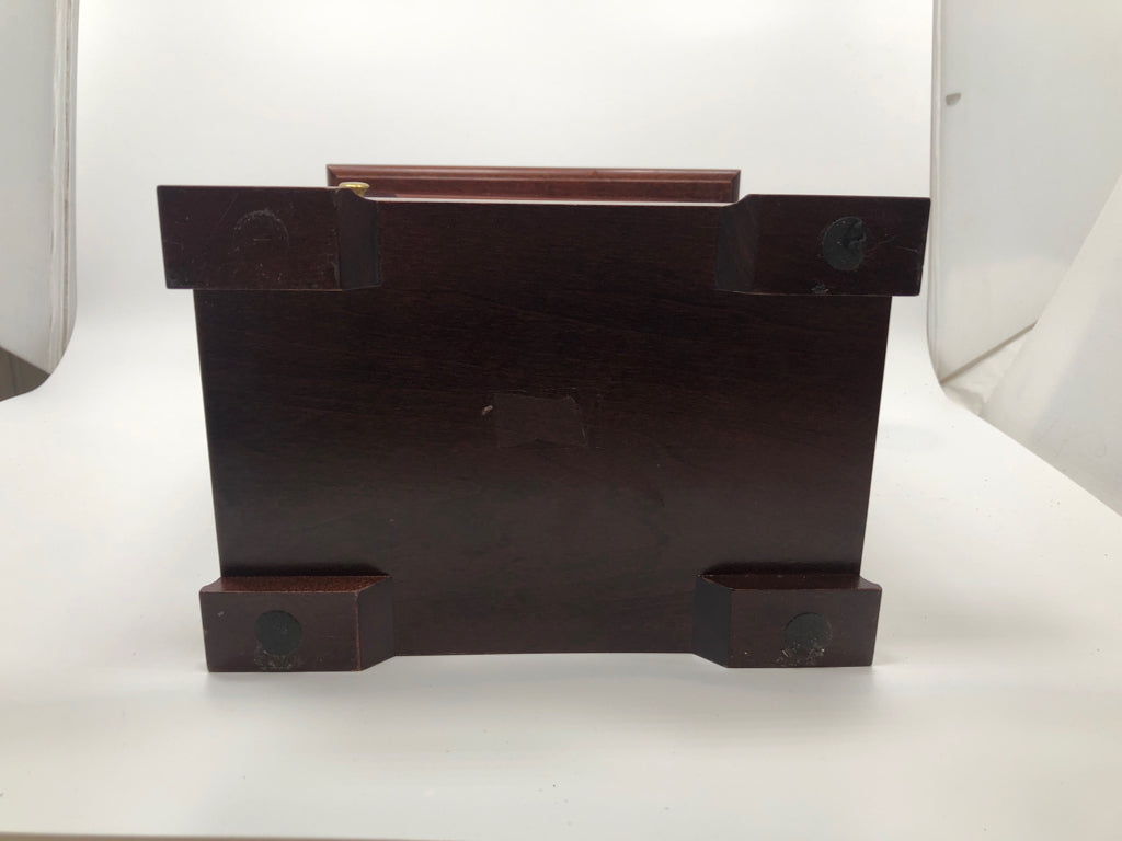 SLIGH CLOCK W/ 3 DRAWERS INSIDE.