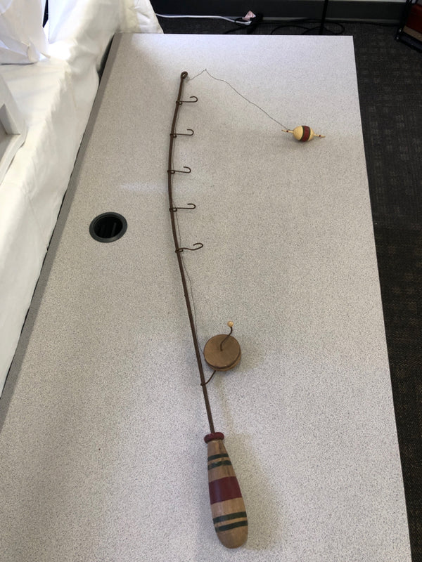 METAL AND WOOD FISHING POLE WITH HOOKS WALL HANGING.