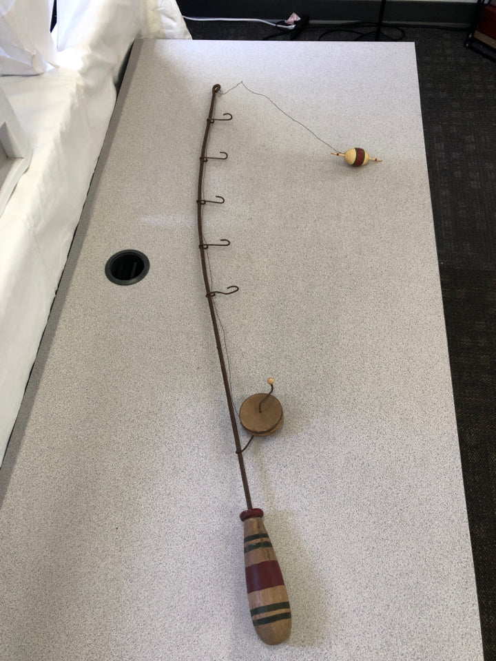 METAL AND WOOD FISHING POLE WITH HOOKS WALL HANGING.