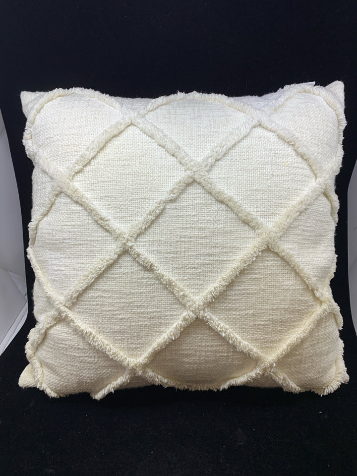 CREAM PILLOW W/DIAMOND TEXTURE.