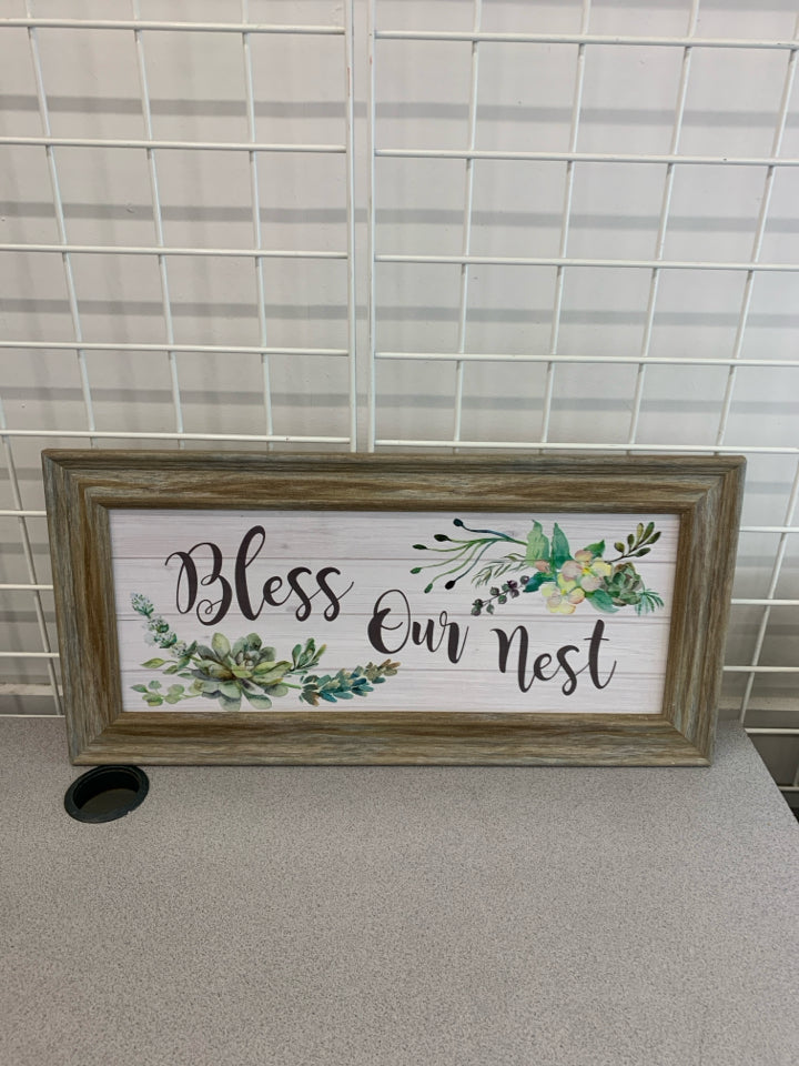BLESS OUR NEST IN LIGHT WOOD FRAME.