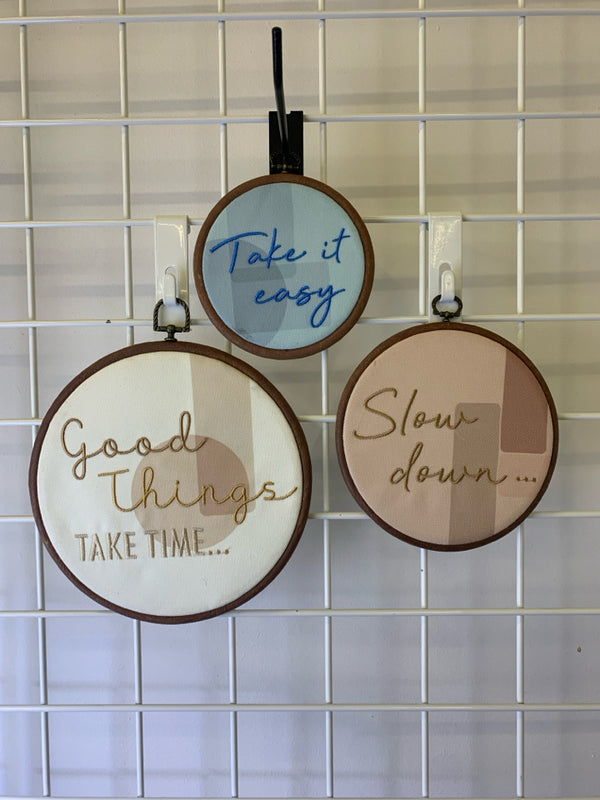 "TAKE IT EASY" 3PC ROUND FABRIC WALL HANGING W/ WOOD FRAME.