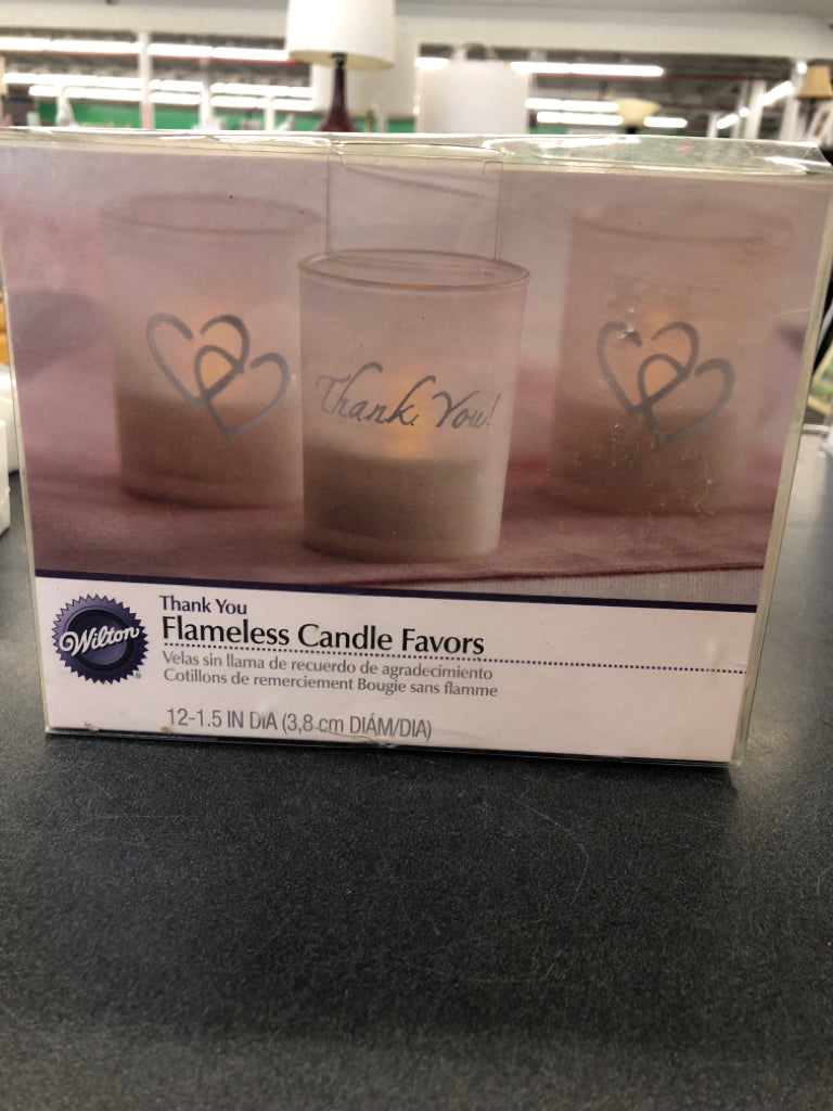 12 NIB FLAMELESS THANK YOU CANDLES.
