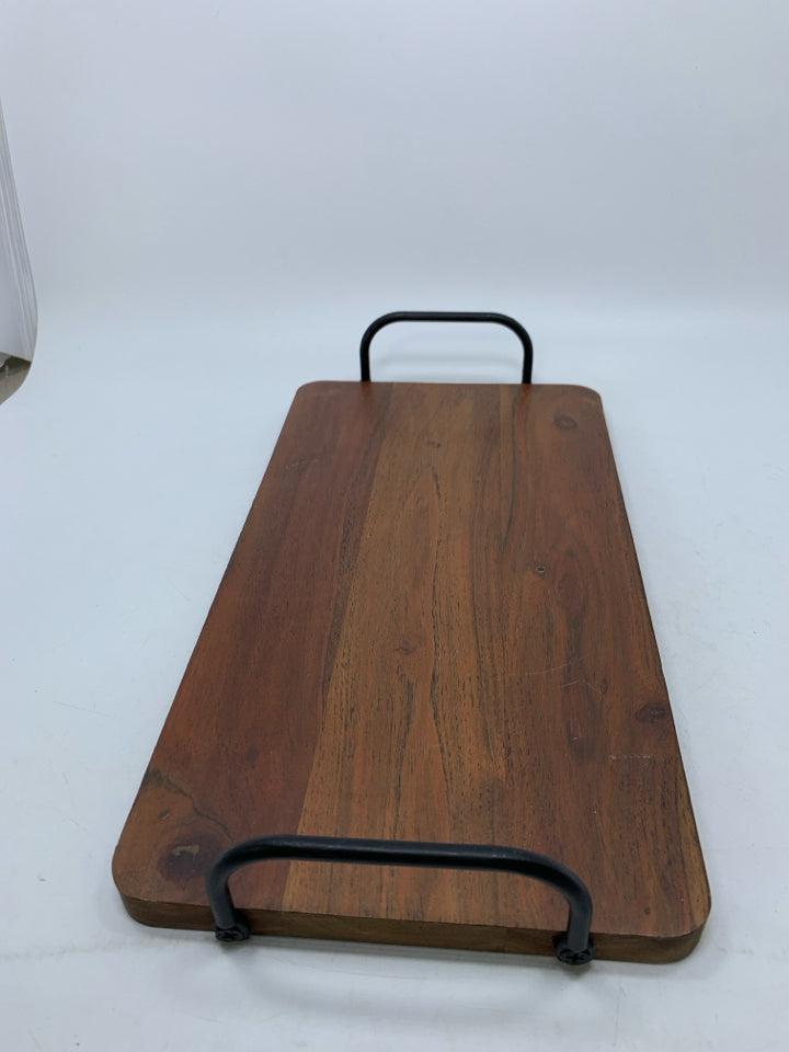 DARK WOOD TRAY W/ BLACK METAL HANDLES.