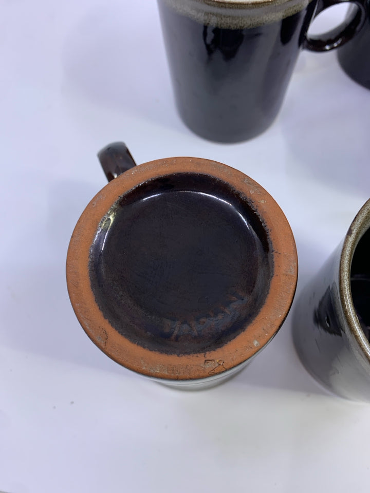 5 BROWN CERAMIC MUGS W/TWO HOLE HANDLE.