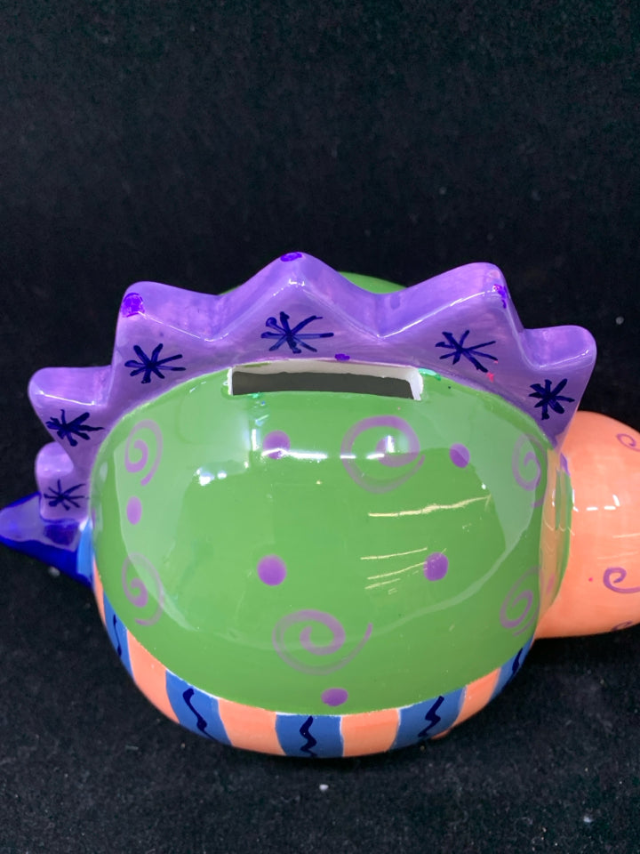 COLORFUL PAINTED DINOSAUR BANK.