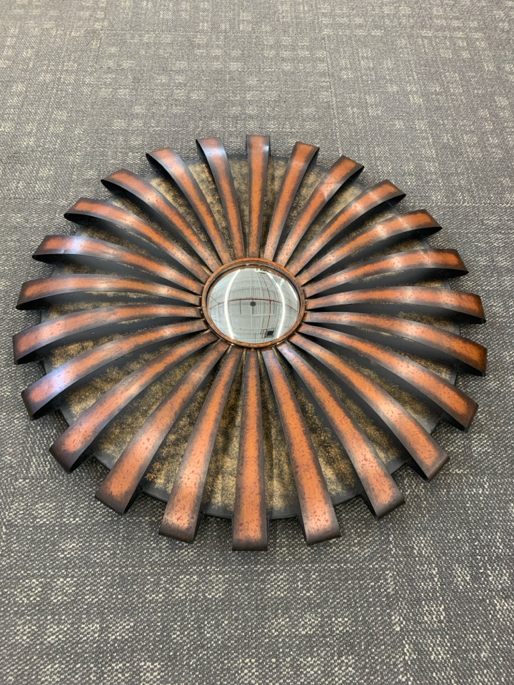 RED TINTED ROUND METAL MIRROR.