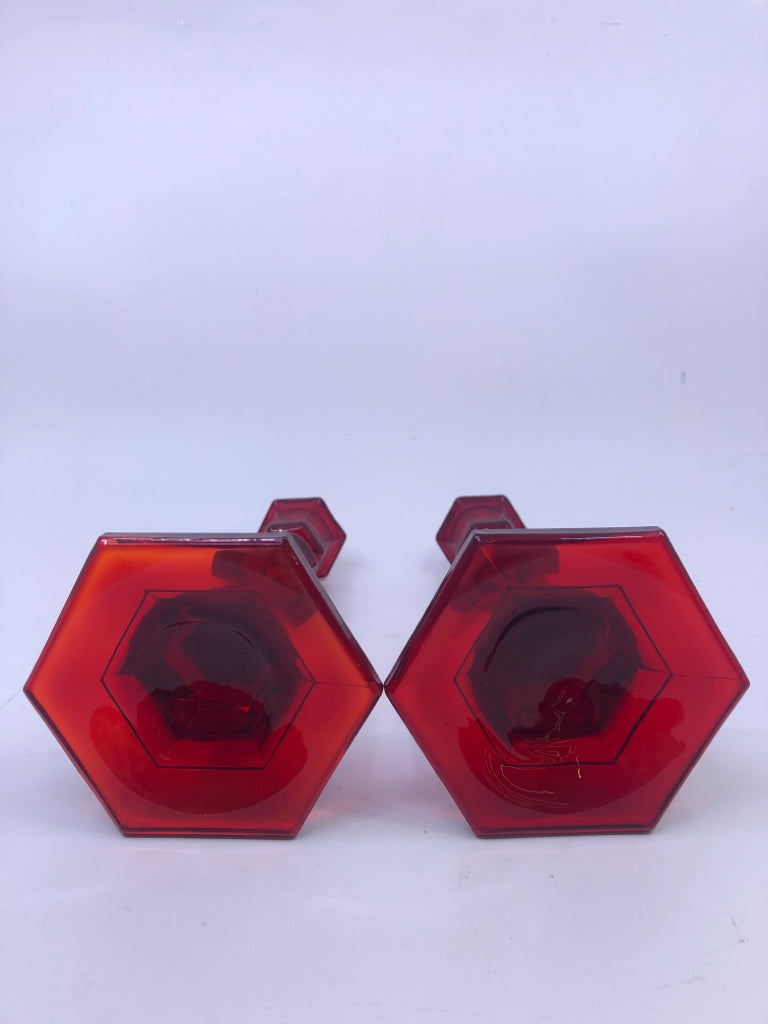 2 RED GLASS TAPER CANDLE HOLDERS.