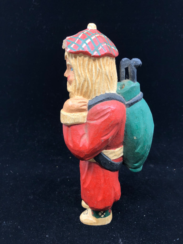 JAMES HADDON WOOD CARVED GOLF SANTA.