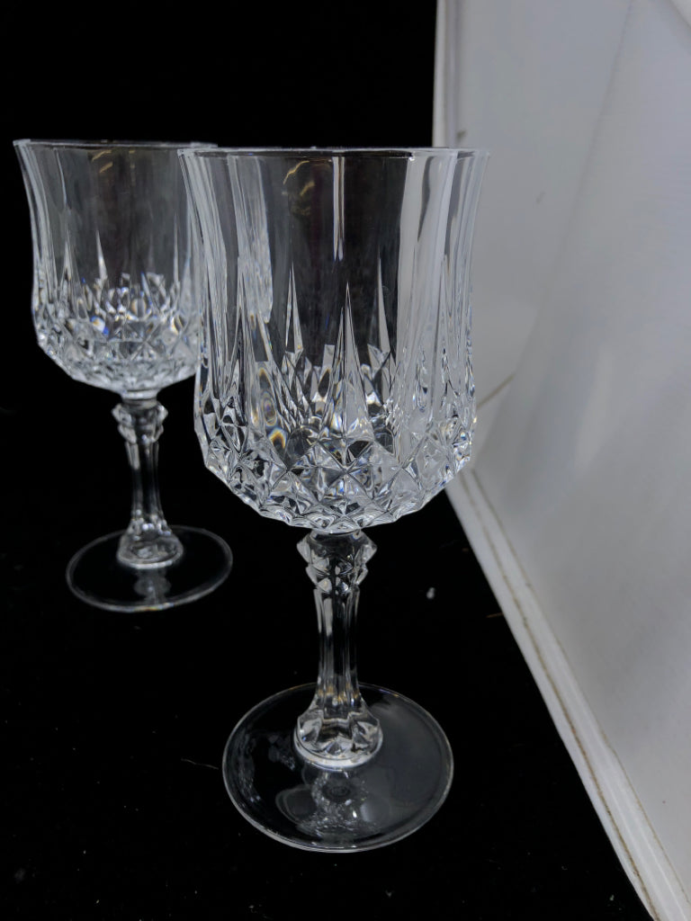6 TALL CUT CRYSTAL WINE GLASSES.